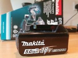 Makita dtw285z impact wrench with 5.0Ah 18v battery and charger